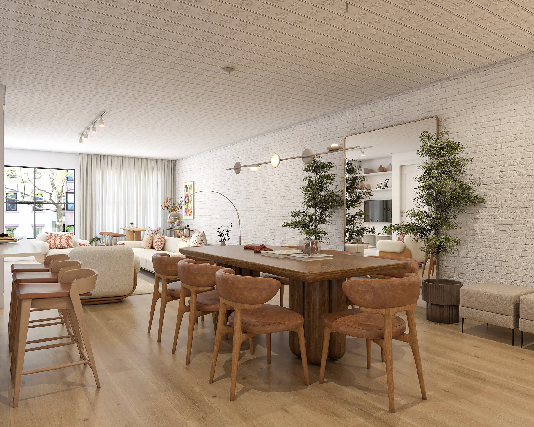 Open-concept living and dining space with natural wood furniture, white walls, and greenery.